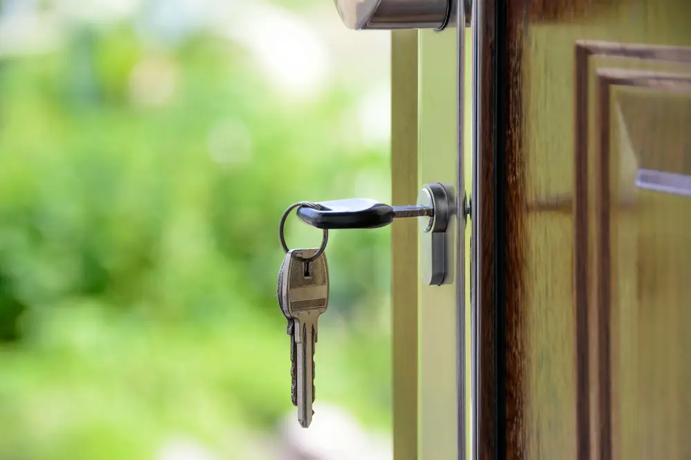 house door with a key in the lock